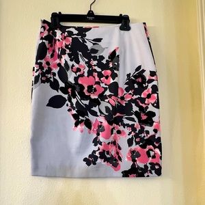 Size 8 skirt. Grey with flowers.